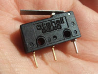 a microswitch with from left to right the 2, 4, 1 pin