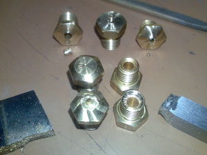 In front: shaped nozzles; 2nd row: original nozzles; 3rd row: broken nozzles