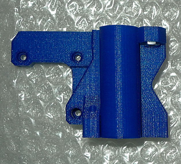 Reverse-engineered, improved Prusa i3 X motor end by AndrewBCN, printed in blue PLA.