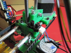 Install the X Axis endstop and flags
